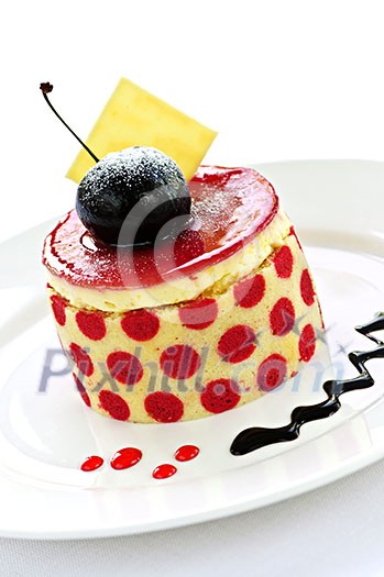 Fancy dessert on a plate isolated on white background Fancy dessert on a plate isolated on white background