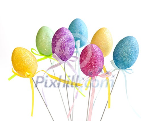 Cute Easter toy eggs isolated on white background
