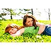 Portrait of happy girls playing on grass
