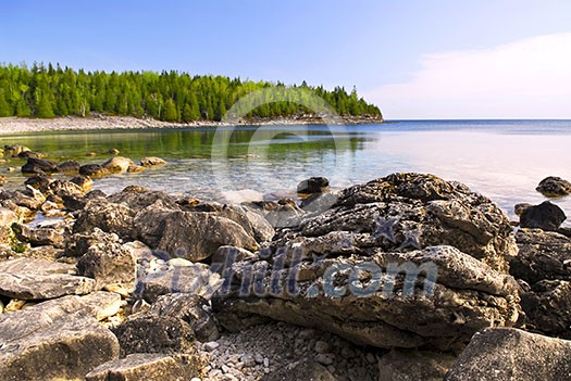 Rocks in clear water of Georgian Bay at Bruce peninsula Ontario Canada Rocks in clear water of Georgian Bay at Bruce peninsula Ontario Canada
