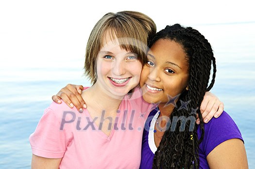 Portrait of two happy teenage girl friends