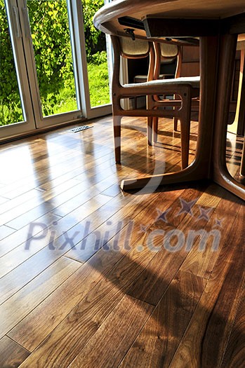 Hardwood walnut floor in residential home dining room Hardwood walnut floor in residential home dining room