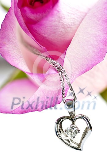 Heart pendant with diamond with a pink rose Heart pendant with diamond with a pink rose