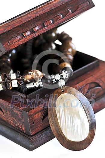Beautiful handcrafted wooden box with aboriginal jewelry Beautiful handcrafted wooden box with aboriginal jewelry