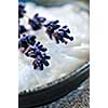 Natural cream skincare with branches of lavender