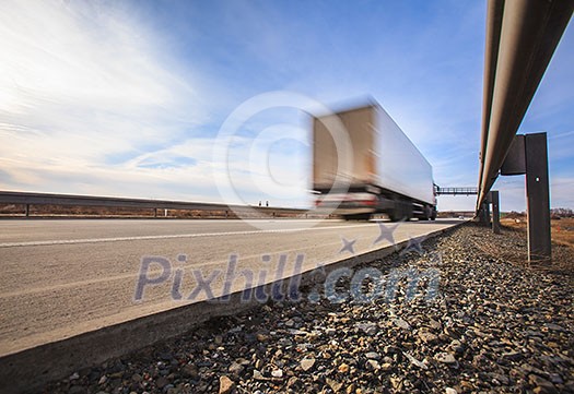 Highway traffic - motion blurred cars on a highway Highway traffic - motion blurred cars on a highway