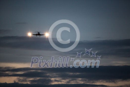 Passenger Airliner flying in the clouds