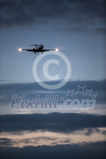 Passenger Airliner flying in the clouds