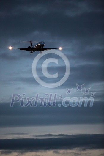 Passenger Airliner flying in the clouds