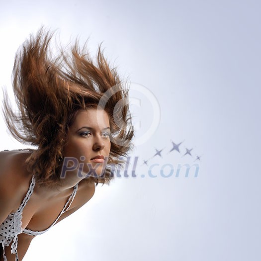 young woman with hair in motion