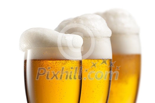 Beer in glasses isolated on white background
