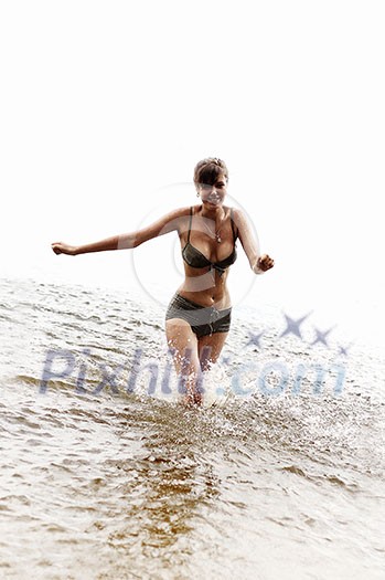 happy girl run in the water happy girl run in the water