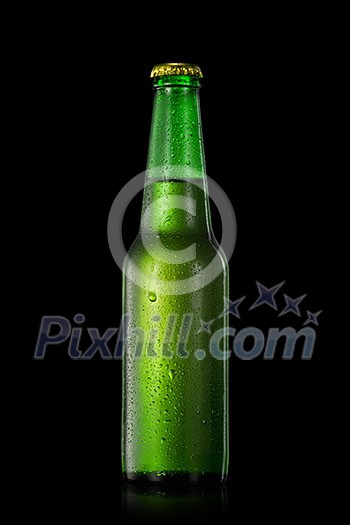 Green beer bottle with water drops isolated on black Green beer bottle with water drops isolated on black