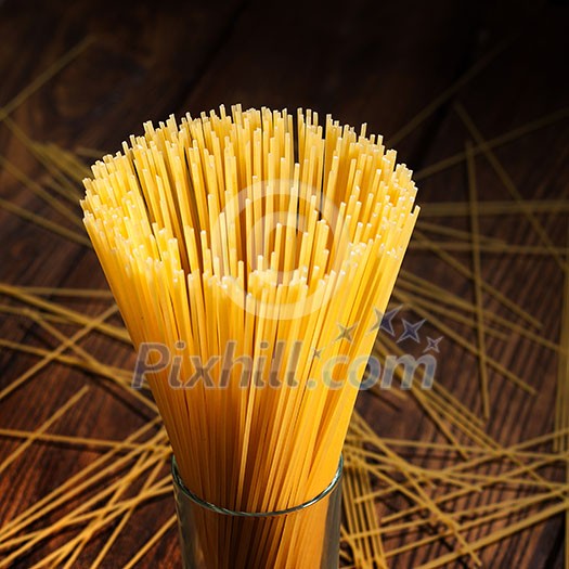 italian spaghetti on black background italian spaghetti on black background