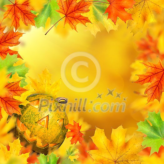 halloween pumpkin with frame made of autumn leaves and yellow background