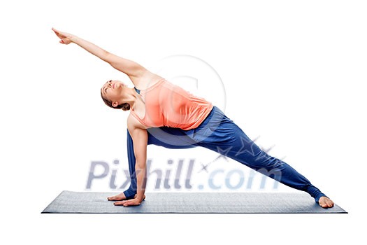 Young fit woman doing Ashtanga Vinyasa Yoga asana Utthita parsvakonasana - extended side angle pose isolated on white Young fit woman doing Ashtanga Vinyasa Yoga asana Utthita parsvakonasana - extended side angle pose isolated on white