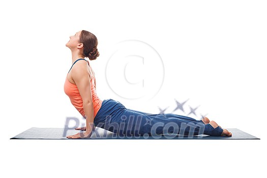 Beautiful sporty fit yogini woman practices yoga asana urdhva mukha svanasana - upward facing dog pose isolated on white Beautiful sporty fit yogini woman practices yoga asana urdhva mukha svanasana - upward facing dog pose isolated on white