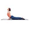 Beautiful sporty fit yogini woman practices yoga asana urdhva mukha svanasana - upward facing dog pose isolated on white