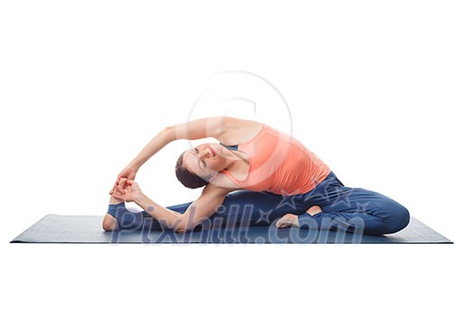 Beautiful sporty fit yogini woman practices yoga asana parivrtta janu sirsasana - revolved head-to-knee pose isolated on white background Beautiful sporty fit yogini woman practices yoga asana parivrtta janu sirsasana - revolved head-to-knee pose isolated on white background