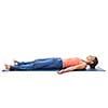 Beautiful sporty fit yogini woman relaxes in yoga asana Savasana - corpse pose isolated on white