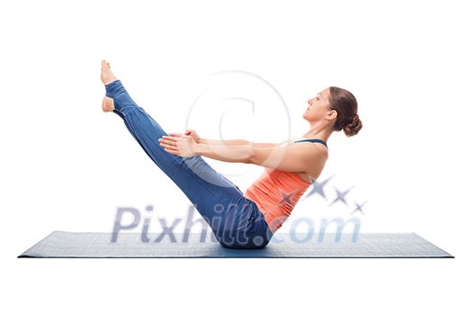 Beautiful sporty fit yogini woman practices yoga asana Paripurna navasana - boat pose isolated on white background Beautiful sporty fit yogini woman practices yoga asana Paripurna navasana - boat pose isolated on white background