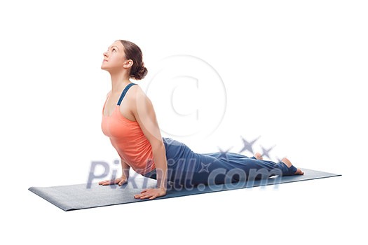 Beautiful sporty fit yogini woman practices yoga asana urdhva mukha svanasana - upward facing dog pose isolated on white Beautiful sporty fit yogini woman practices yoga asana urdhva mukha svanasana - upward facing dog pose isolated on white