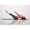 Beautiful sporty fit yogini woman practices yoga asana Uttana padasana - raised legs pose