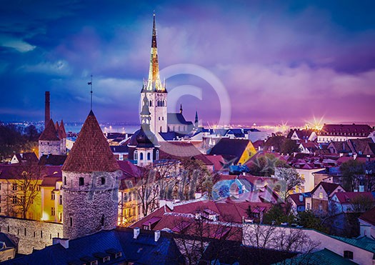 Vintage retro effect filtered hipster style image of Tallinn Medieval Old Town illuminated in evening twilight, with dramatic sky Estonia Vintage retro effect filtered hipster style image of Tallinn Medieval Old Town illuminated in evening twilight, with dramatic sky Estonia