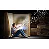 Teenager boy wearing jeans and shirt and reading book