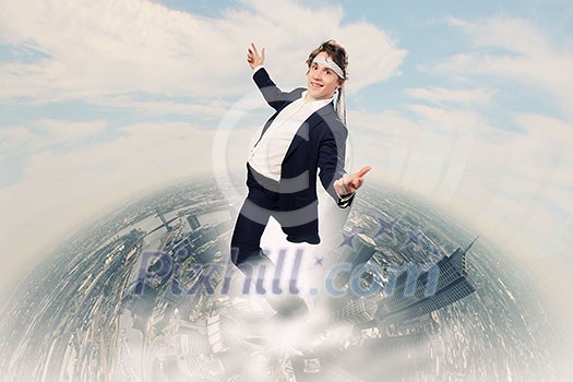 Young funny businessman wearing tie around head