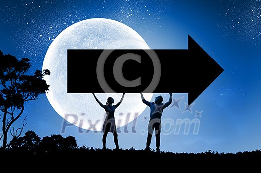 Silhouettes of young couple against full moon Silhouettes of young couple against full moon