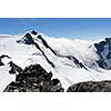 Mountain landscape with snow and clear blue sky