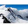 Mountain landscape with snow and clear blue sky