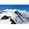 Mountain landscape with snow and clear blue sky