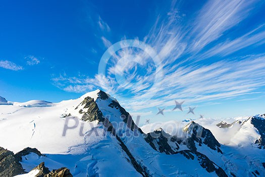 Mountain landscape with snow and clear blue sky