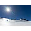 Mountain landscape with snow and clear blue sky