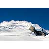 Mountain landscape with snow and clear blue sky