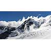 Mountain landscape with snow and clear blue sky