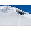 People walking among snows of New Zealand mountains