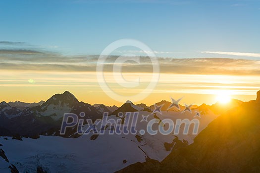 Mountain landscape with snow and clear blue sky