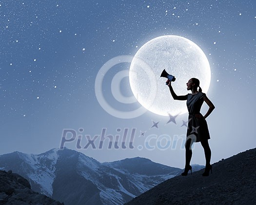 Silhouette of woman on top of rock screaming in megaphone Silhouette of woman on top of rock screaming in megaphone