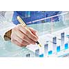 Businessman hand writing with pen and digital business infographs