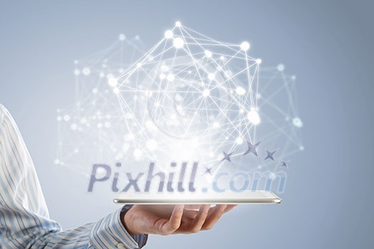 Businessman holding in hand tablet with global connection concept Businessman holding in hand tablet with global connection concept