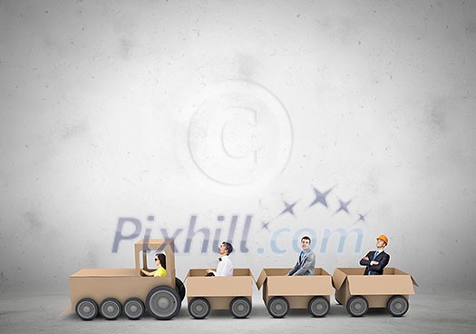 Business people riding carton train. Teamwork concept Business people riding carton train. Teamwork concept