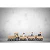Business people riding carton train. Teamwork concept