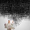 Portrait of young businesswoman in white suit reading blank newspaper