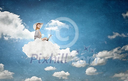 Woman in dress and hat sitting on cloud and working on laptop Woman in dress and hat sitting on cloud and working on laptop