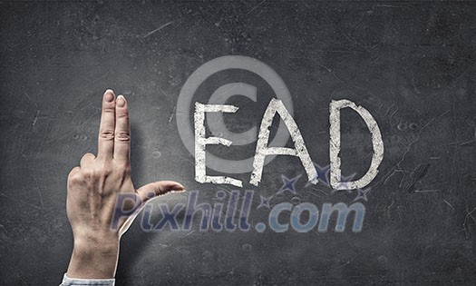 Word lead written on wall and fingers instead of letter L