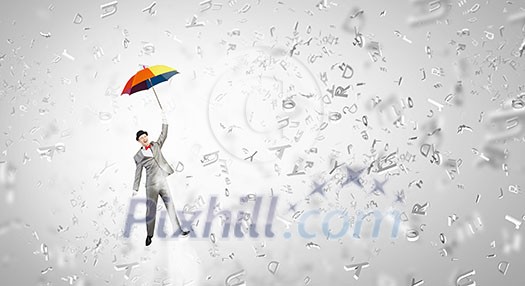 Businessman flying in sky on colorful umbrella Businessman flying in sky on colorful umbrella