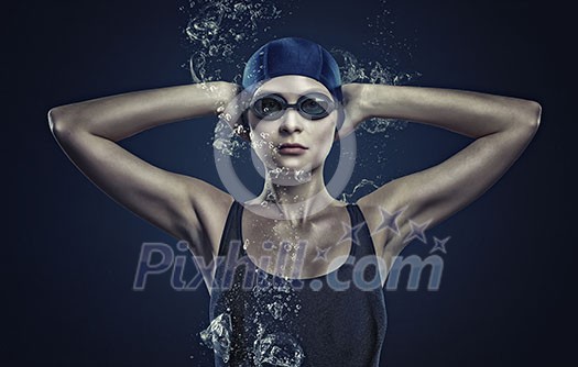 Portrait of woman swimmer in cap and glasses Portrait of woman swimmer in cap and glasses